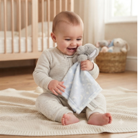 E08807: Furry Elephant Comforter With Taggie Ribbons